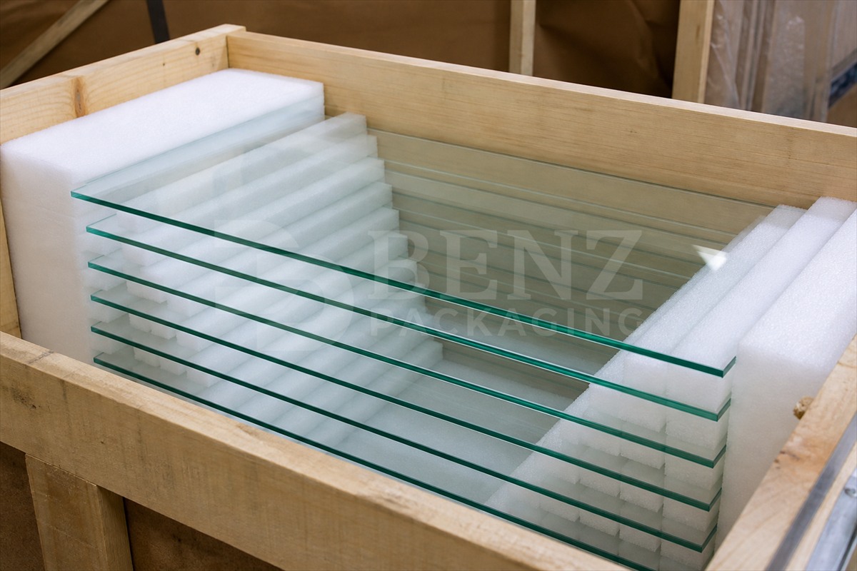 foam layers between glass components in a crate