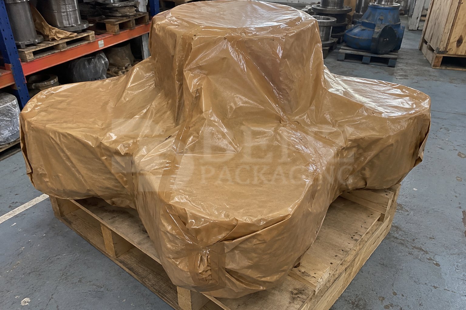 Irregular propeller-hub-shaped load fully covered with PE-coated VCI paper