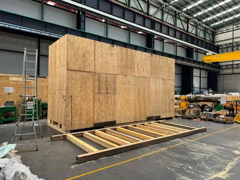 Seaworthy plywood export case built for heavy machinery with integrated skid base