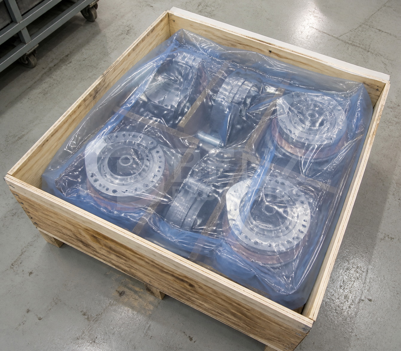 Multimetal VCI film packaging for an aircraft wheel brake inside a lined export crate in an industrial parts-protection scenario.