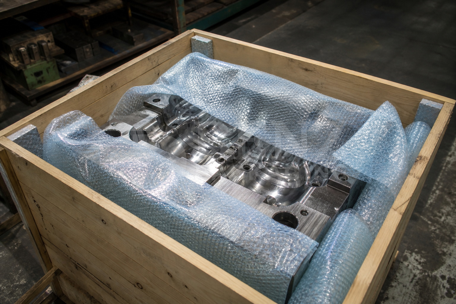 VCI bubble film cushioning a mould polished cavity in an industrial protective pack.